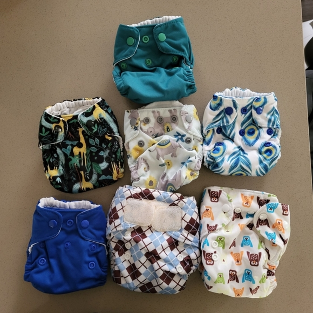 Lot of 7 Thirsties All-in-One newborn & size 1 diapers and Dekor wet bag